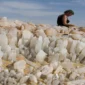 Close-up view of Crystal Mountain’s quartz formations sparkling under the sun in Egypt’s Western Desert, visited by travelers on a Heart Egypt Tours desert safari.